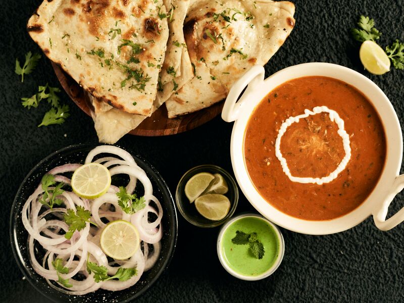 Traditional Indian curry with naan